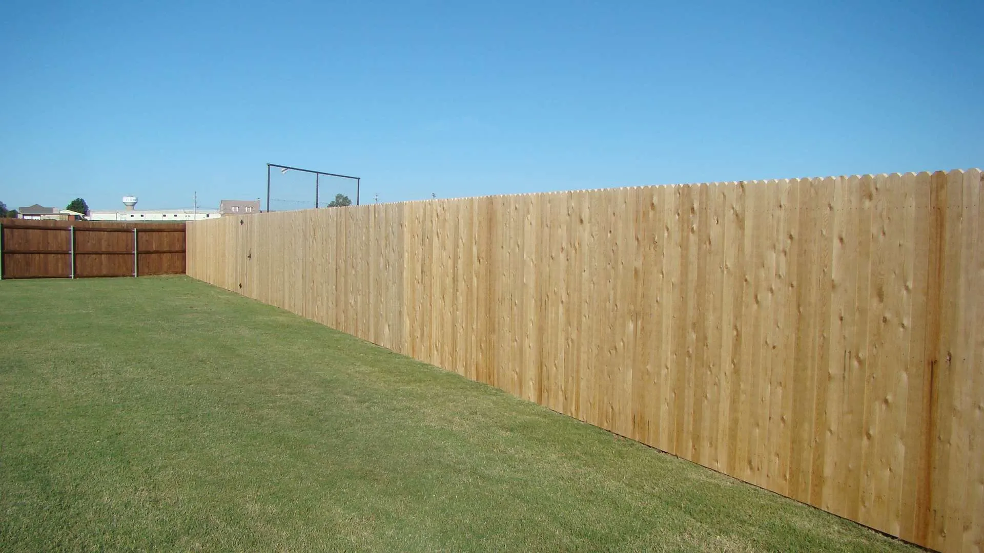 Cedar Tone Before a new fence that has not been stained