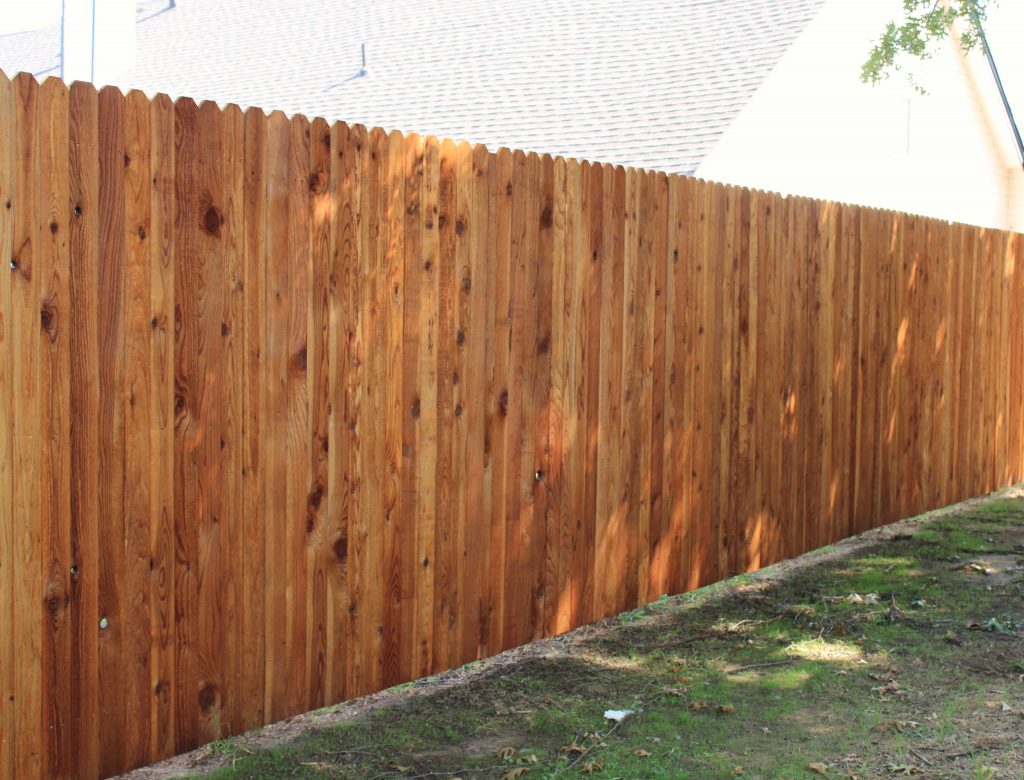 Cedar Tone wood defender wood defender cedar tone color on a fence