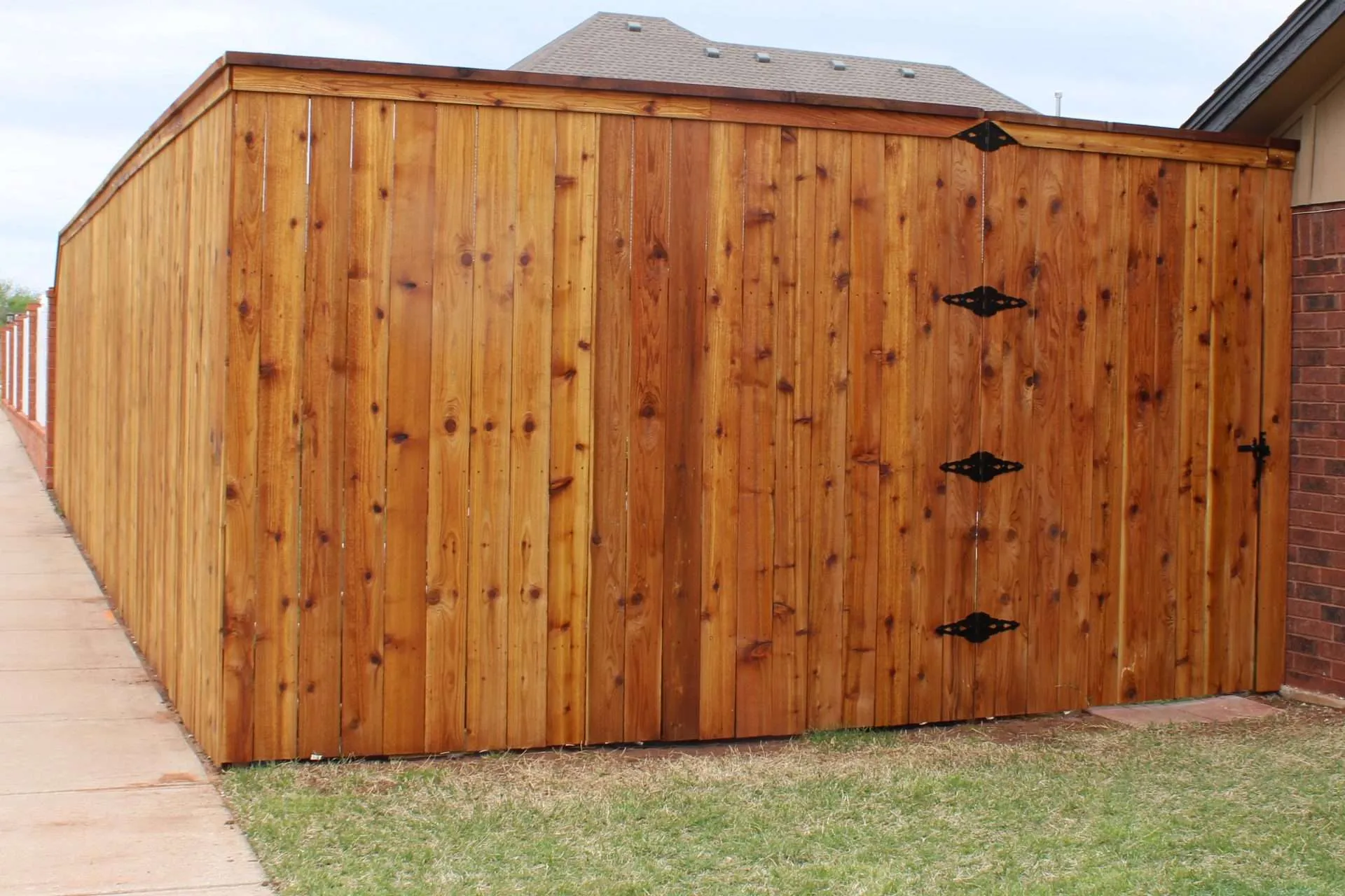 Clear Glow After A cedar fence that has just been stained with wood defender clear glow stain and sealer.