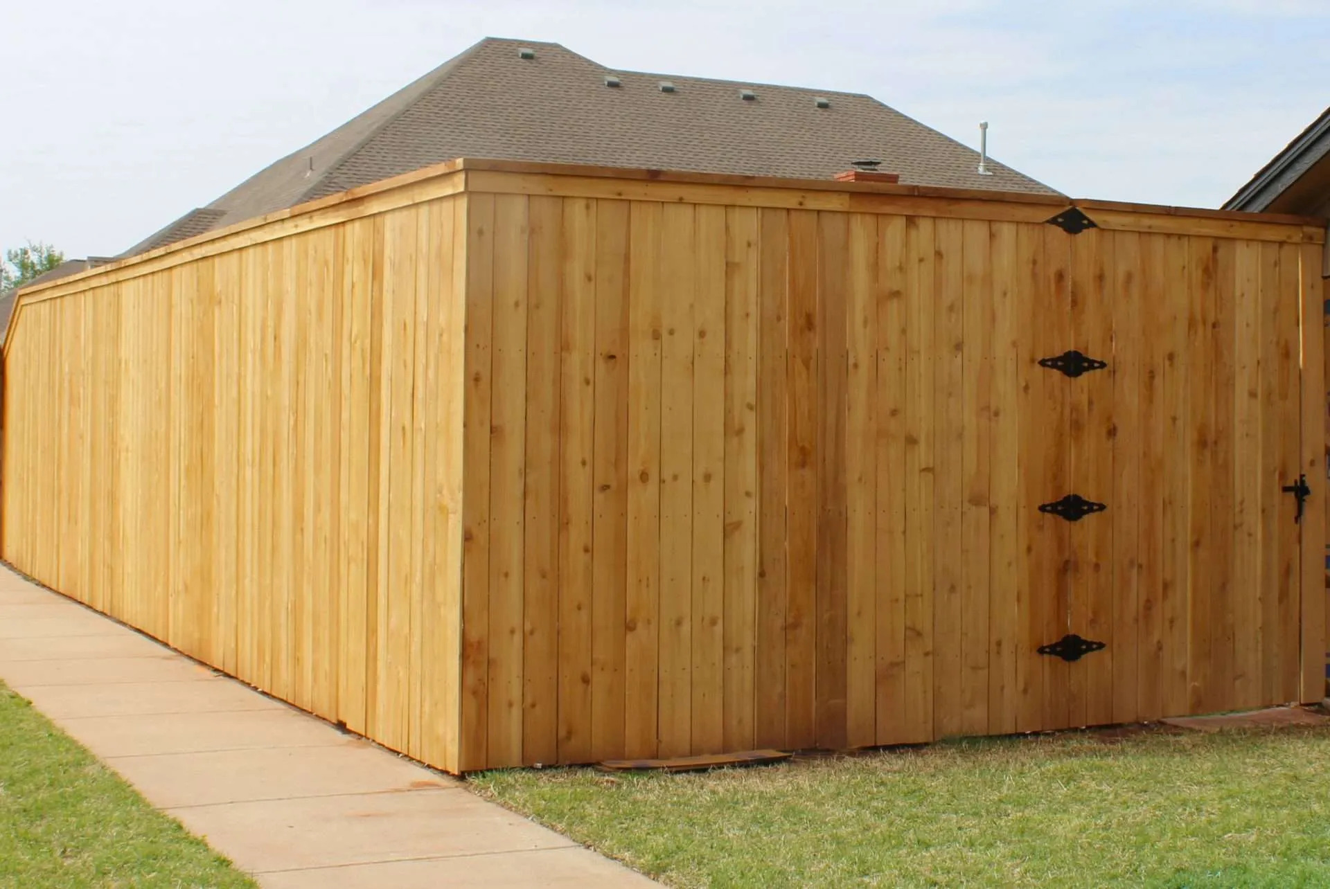 Clear Glow a new cedar fence that is ready to be stained.