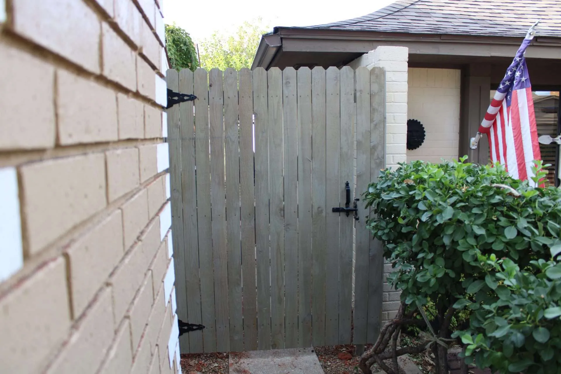 IMG_0563 a wooden gate with cape cod gray fence stain on it