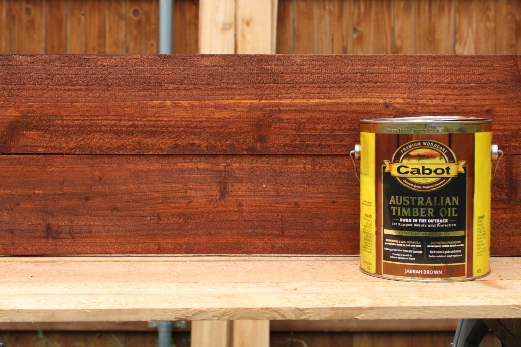 IMG_0744 cabot australian timber oil stain on two fence pickets to show the color