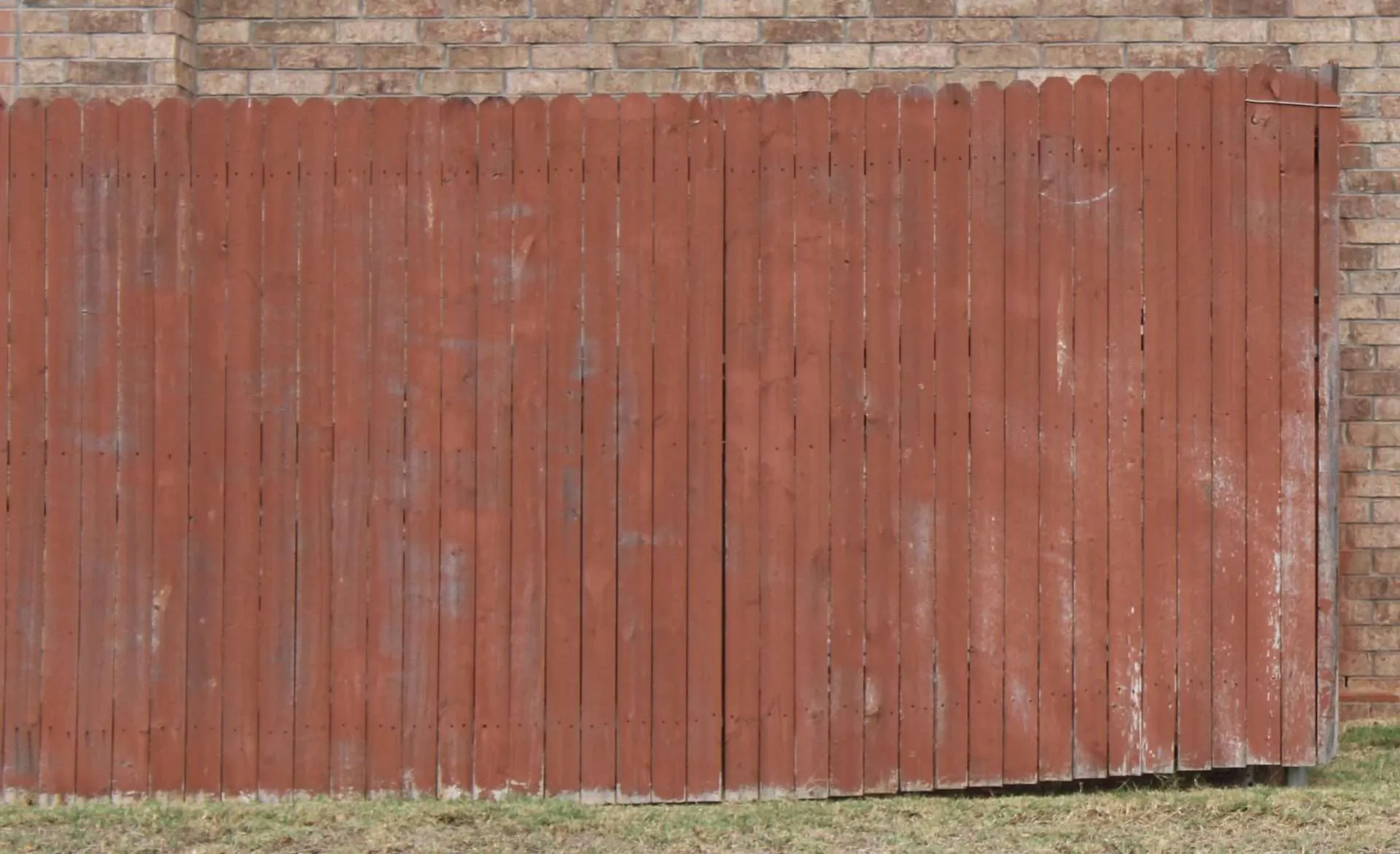 fence paint flaking a fence with paint flaking off showing one of the cons of fence staining