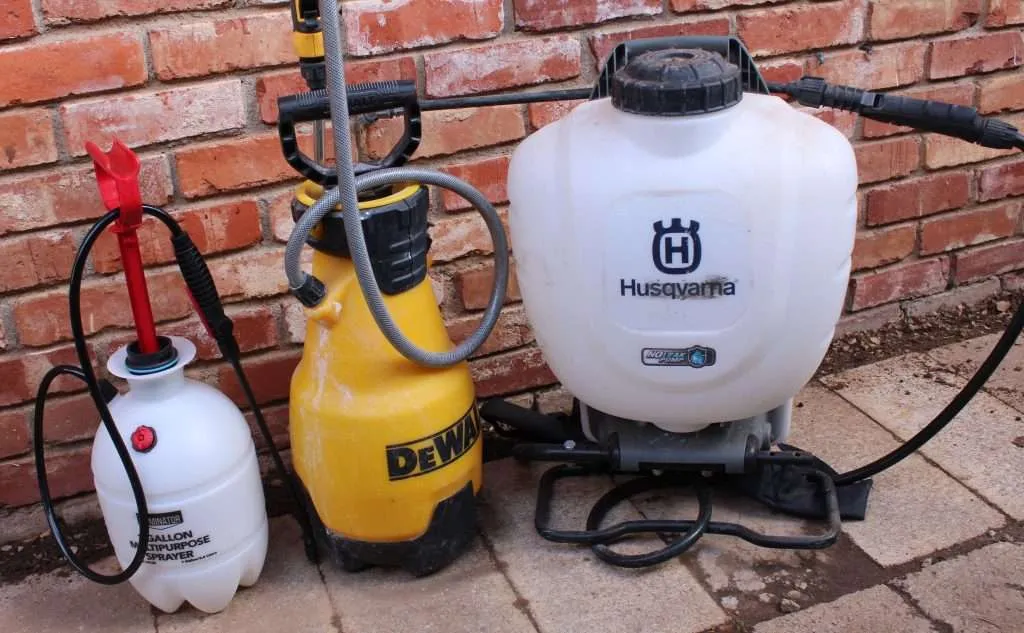 pump sprayers the best pump sprayers for staining a fence lined up in a row
